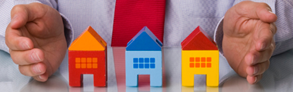 Multi-colored Toy Homes represent various mortgage
 types